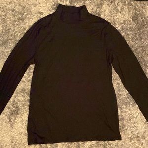 Never worn turtle neck. Great material just didn’t have anything to match.